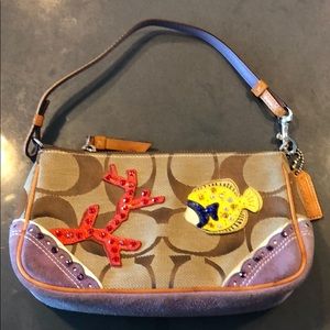 Coach bag with hand-glued SWAROVSKI crystals